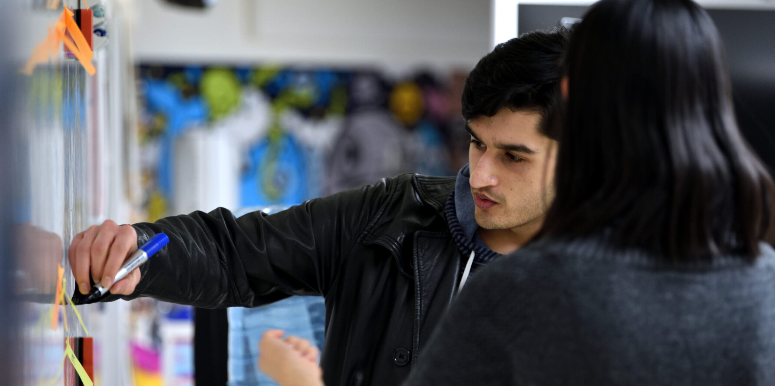 Students using whiteboard