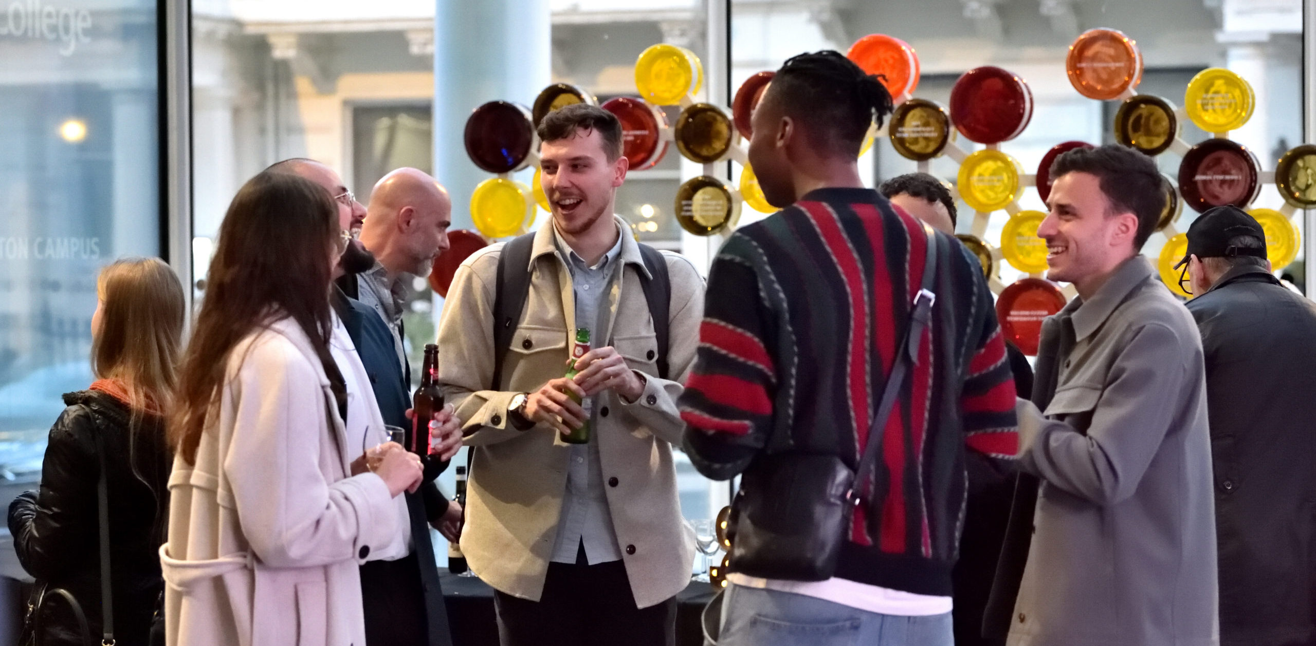 Group of students socialising at an event